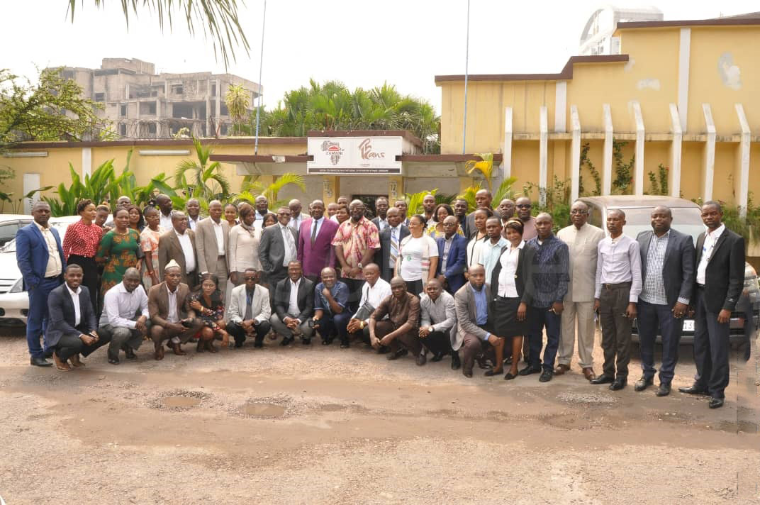 Participants pose for a group photo during the press conference. Photo© Pacifique MUKUBITO/CONAREF