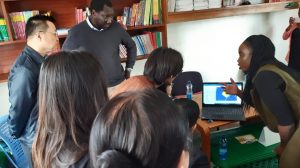 Pamoja Trust and the community in Mashimoni demonstrating the STDM to the Chinese delegation and how it is used to generate social and spatial data in the informal settlements within Kenya