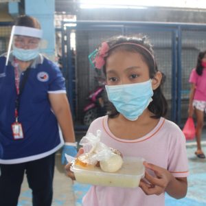 Underweight children under the age of 12 receiving supplemental feeding during the community quarantine to sustain their nutritional needs, a community-based intervention in Valenzuela (photo c/o of HPFPI Valenzuela)