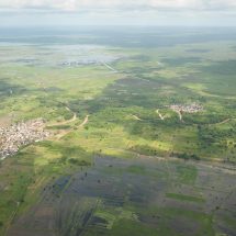 An aerial view of flooding in two towns near Jowhar, Somalia, on November 12. Heavy rains in Somalia, coupled with recent disputes between clans, has resulted in over four thousand IDPs seeking shelter at an AMISOM military base near the town of Jowhar, with more arriving daily. AU UN IST Photo / Tobin Jones