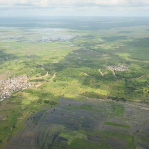 An aerial view of flooding in two towns near Jowhar, Somalia, on November 12. Heavy rains in Somalia, coupled with recent disputes between clans, has resulted in over four thousand IDPs seeking shelter at an AMISOM military base near the town of Jowhar, with more arriving daily. AU UN IST Photo / Tobin Jones
